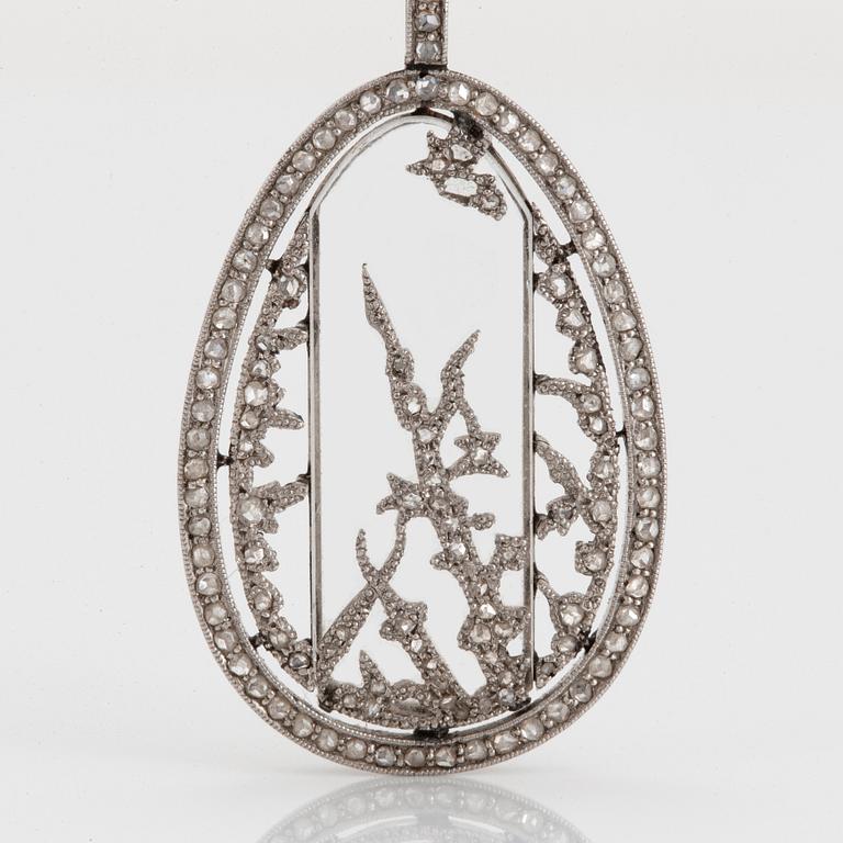 Fabergé, a jewelled platinum and rock-crystal pendant, design Alma Pihl.