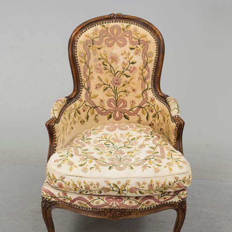 An end of the 19th century Louis XV style oak bergere.