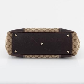 Gucci, a monogram canvas handbag.