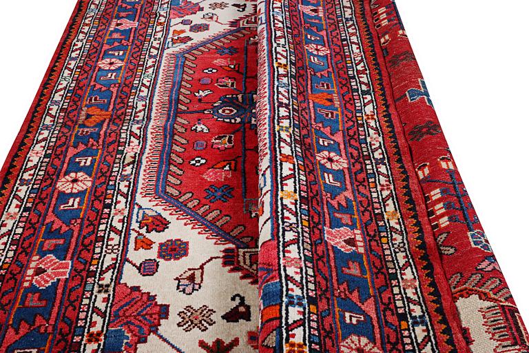 A Nahavand rug, c. 230 x 151 cm.