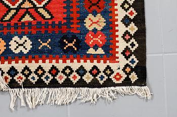 A kelim rug, 342 x 150 cm.