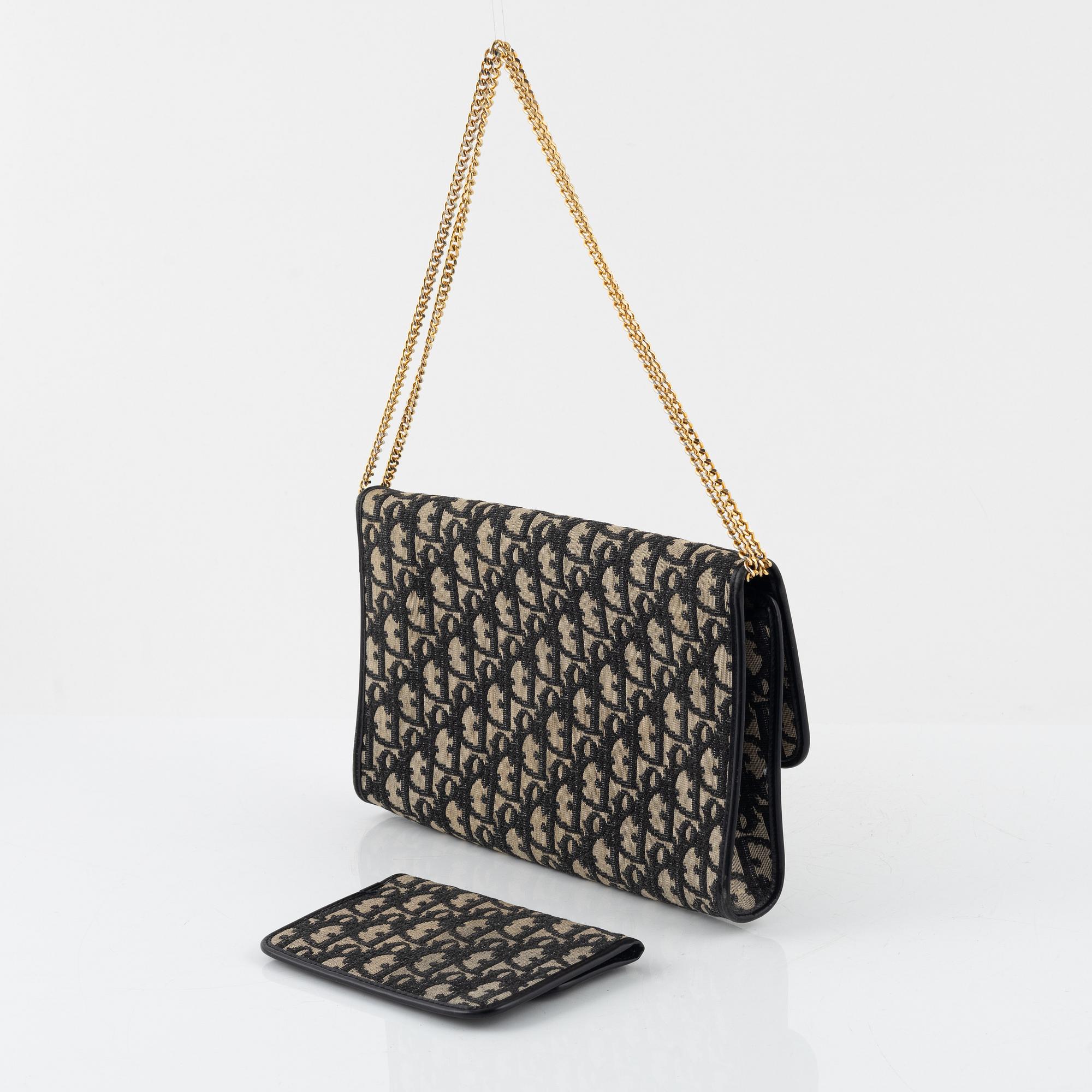 Christian Dior, handbag and wallet.