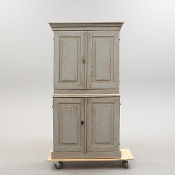 A first half of the 19th century painted cabinet.