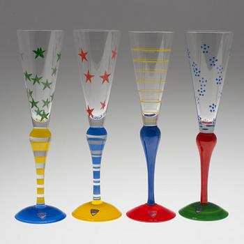 A set of eight Orrefors "Clown" glass champagne flutes design Anne Nilsson.