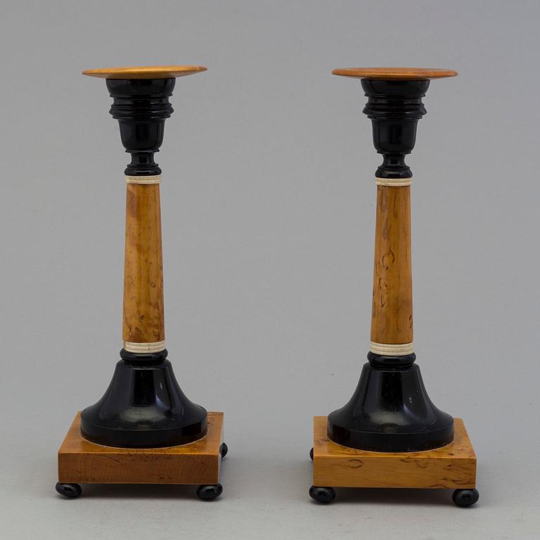 A pair of birch candles by Karl A Axelsson, konstsvarvare, Eksjö, 1907.
