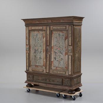 a painted cabinet, partly 18th century.