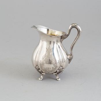 A 3 part silver coffee service dated 1937.