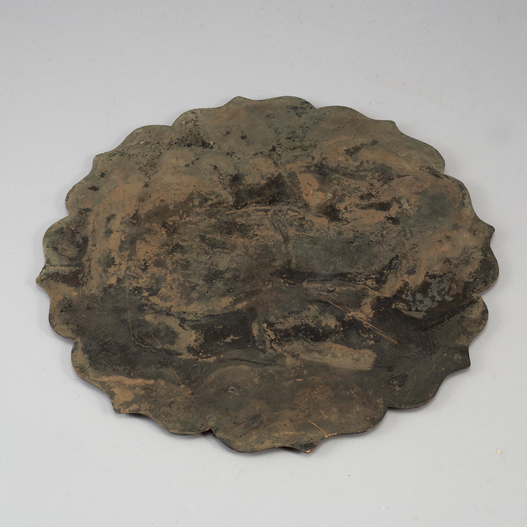 A large bronze mirror, China, Qingdynasty (1664-1912).