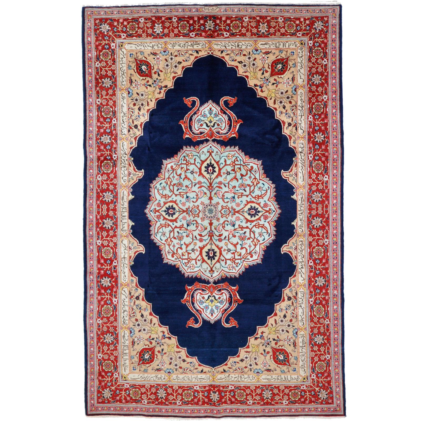 A carpet, Tabriz signed Nematzadeh, ca 291 x 176 cm.