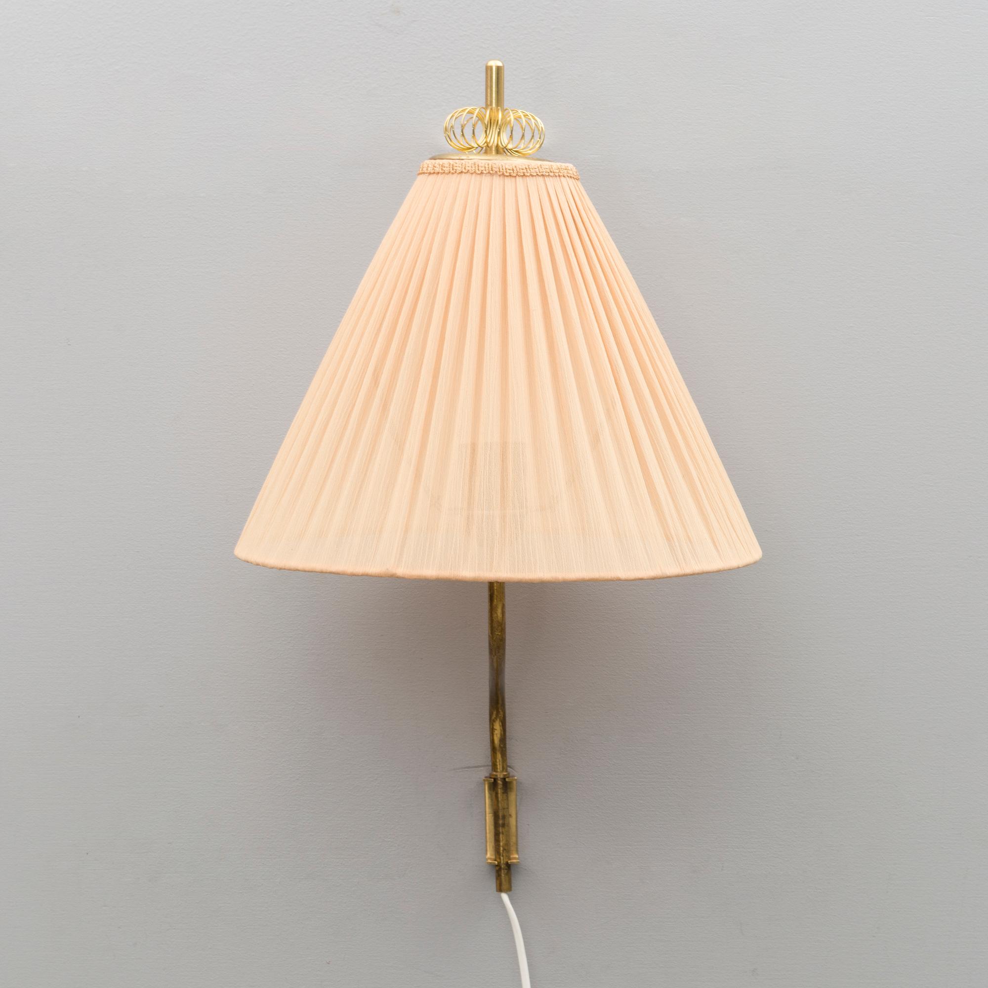 A mid 20th century wall light marked Idman, Finland.