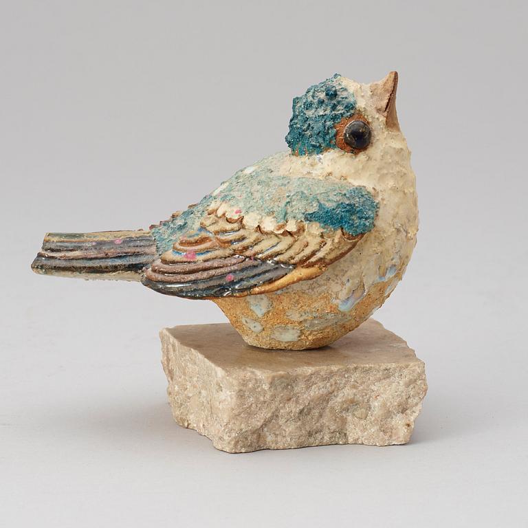 A Tyra Lundgren stoneware figure of a bird.