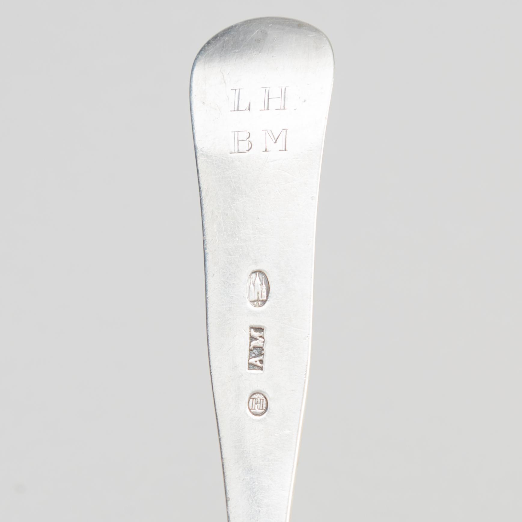 Two Silver Serving Spoons, including a Rococo-Revival spoon with mark PR Hinnerup, Denmark 1851.