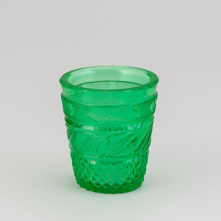 A green tinted cut vodka glass, Russia, Imperial glass manufactory, St Petersburg, 19th Century.