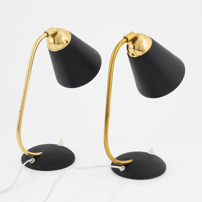 A pair of model '40' wall lights / table lights, EWÅ, Värnamo, mid 20th Century.