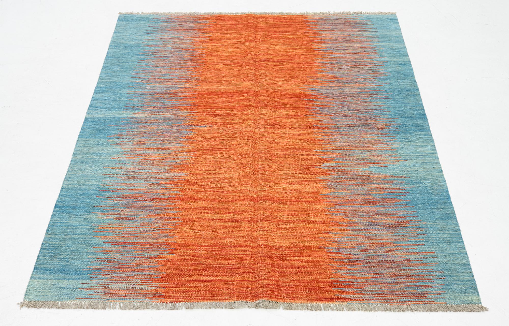 A kilim carpet 244 x 171 cm.