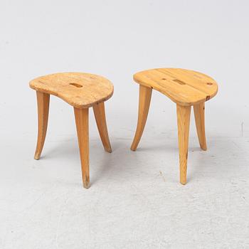 A pair of pine stools by Rune Larssson Ambjörby.