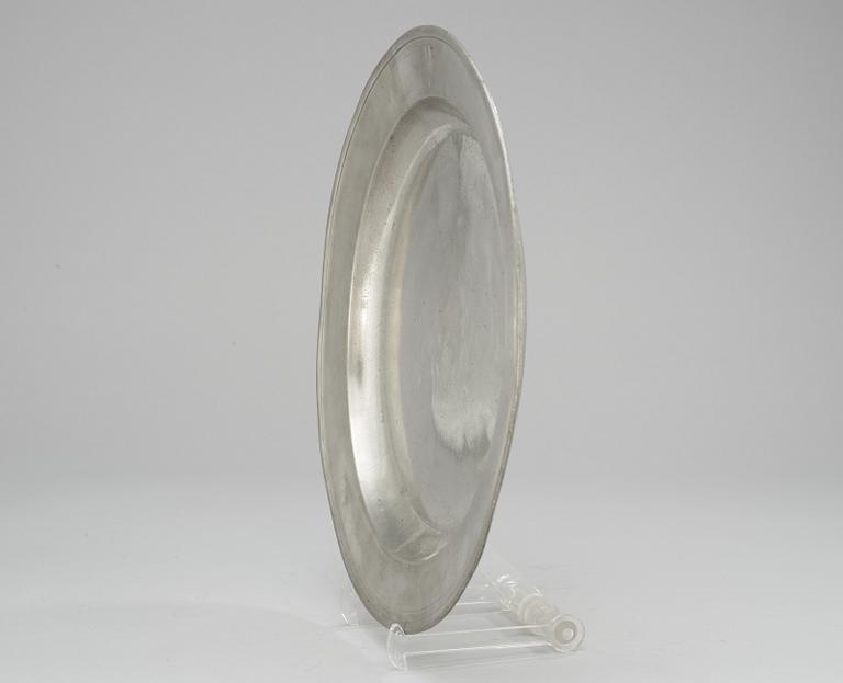 A pewter plate, makers mark by Peter Karm, Hudiksvall (1756-1758).