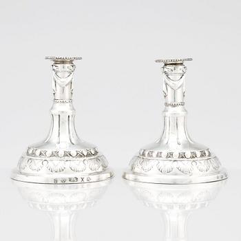 A pair of Swedish silver candlesticks, marks of Sigismund Novisadi the younger, Karlskrona 1780.