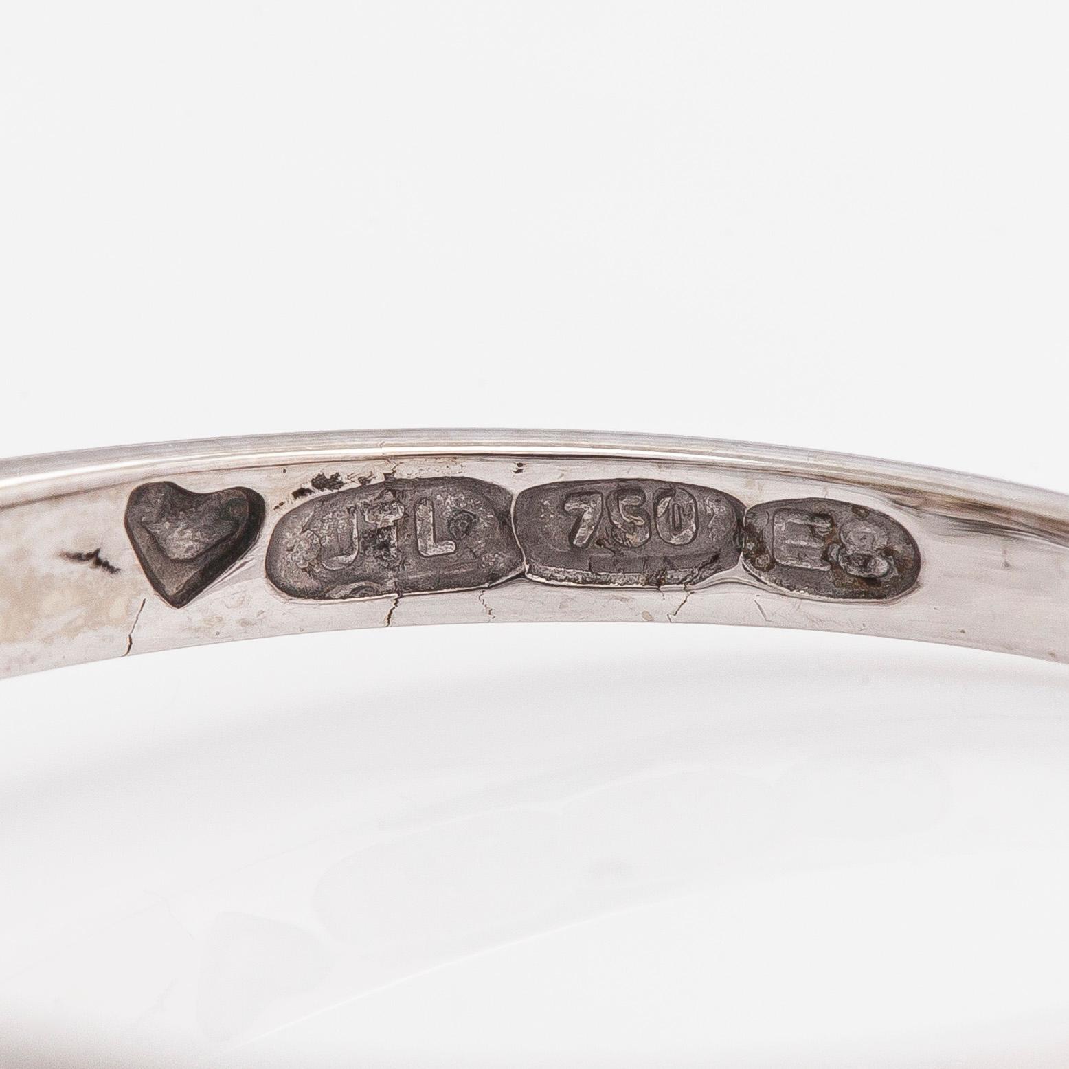 An 18K white gold, set with brilliant-cut diamonds. With IGI report.