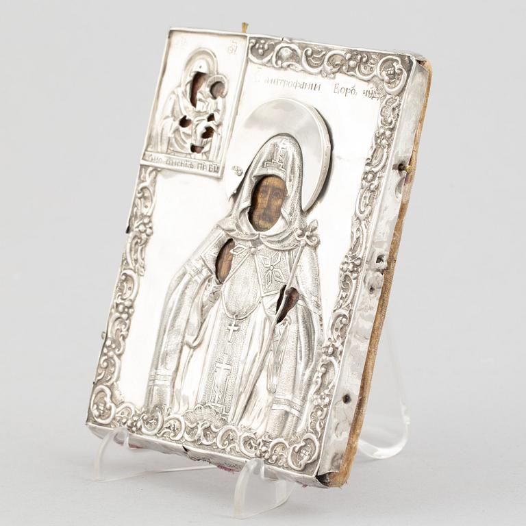 A Russian icon, with silver oklad, DN Dubinin (active 1849-54), St Petersburg.