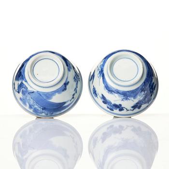 A matched set of eight blue and white cups and stands, Qing dynasty, Kangxi (1662-1722).