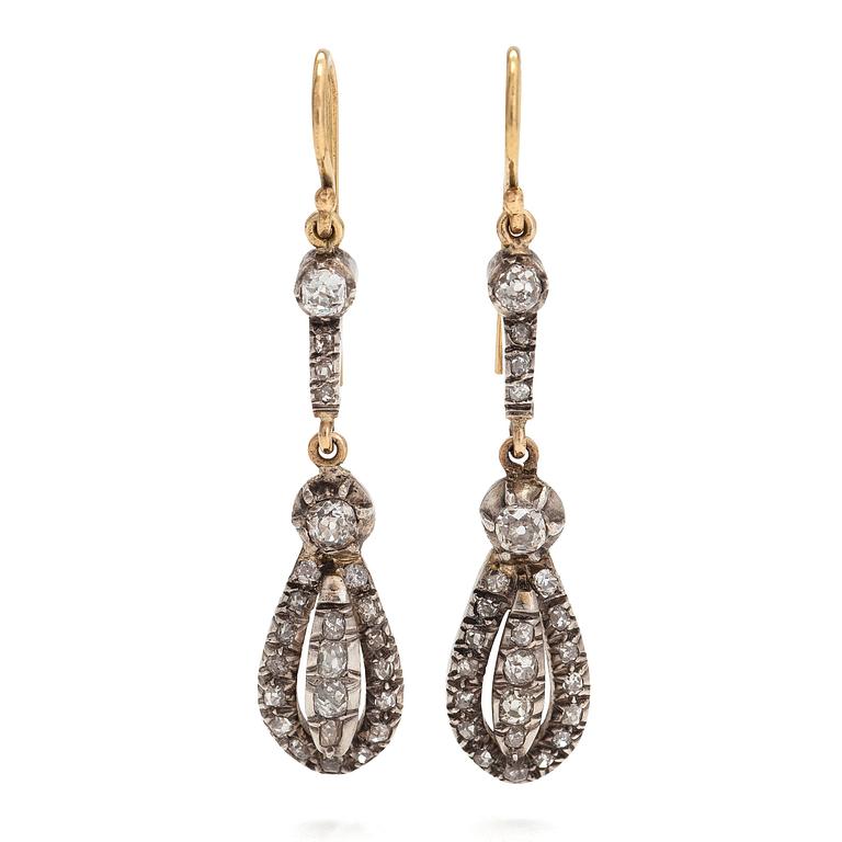 A pair of  gold and silver earrings with old and single-cut diamonds.