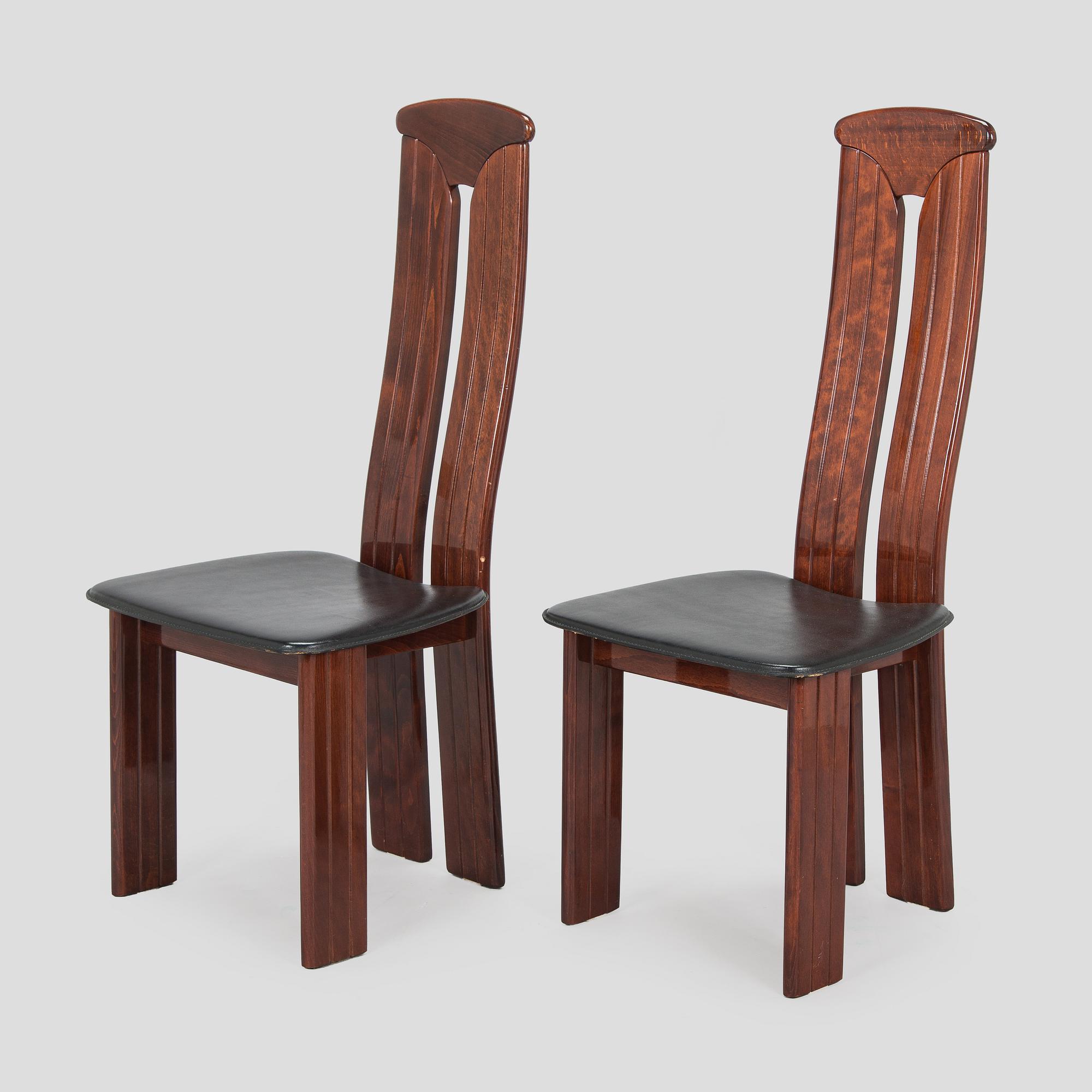 A set of eight dining chairs, Italy.