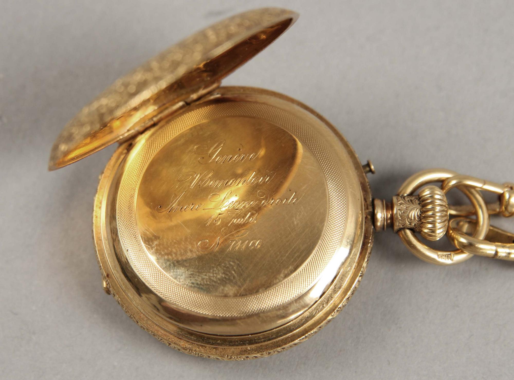 DAMFICKUR med kedja, 18 K guld.