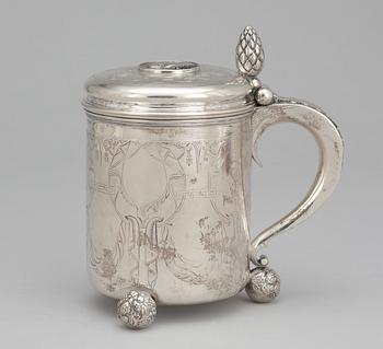 A Baroque style tankard with no silver marks.