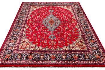 A Keshan carpet, c. 360 x 250 cm.