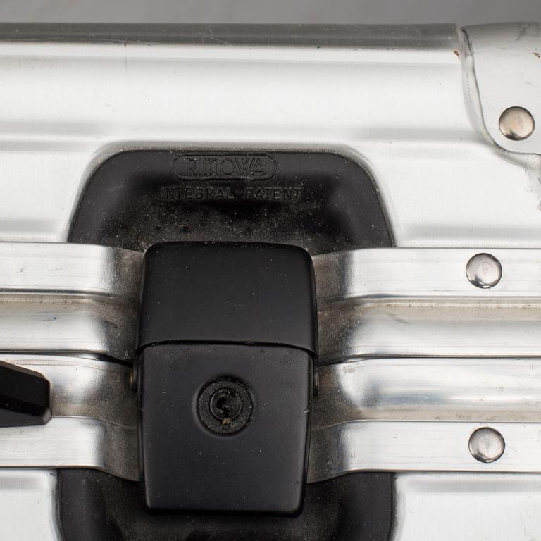 A set of three Rimowa bags later part of the 20th century.