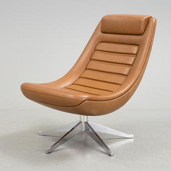 A "Manzù Lounge Chair" by Pio Manzu for Alias.