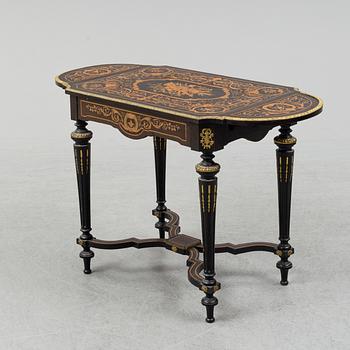 A Louis XVI-style table from the first half of the 20th century.