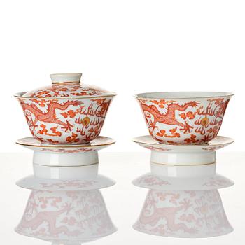 A pair of five clawed dragon bowls on stands and a cover, Qing dynasty, Daoguang mark and period (1821-50).