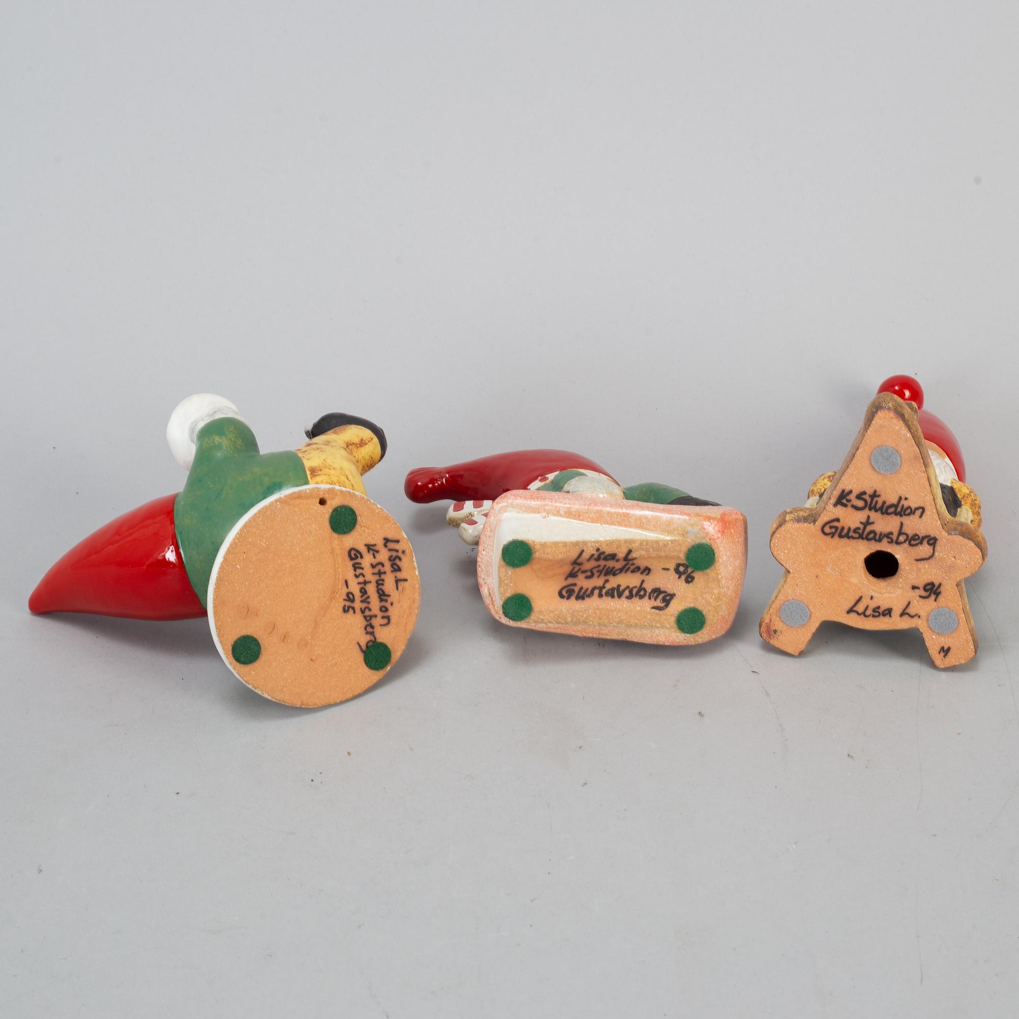 A set of three stoneware candlesticks/figurines, K-studion Gustavsberg.