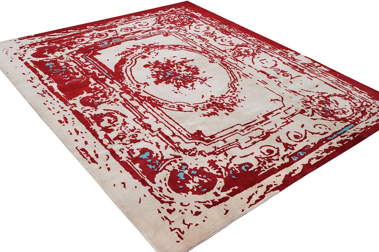 An oriental carpet, c. 300 x 248 cm.