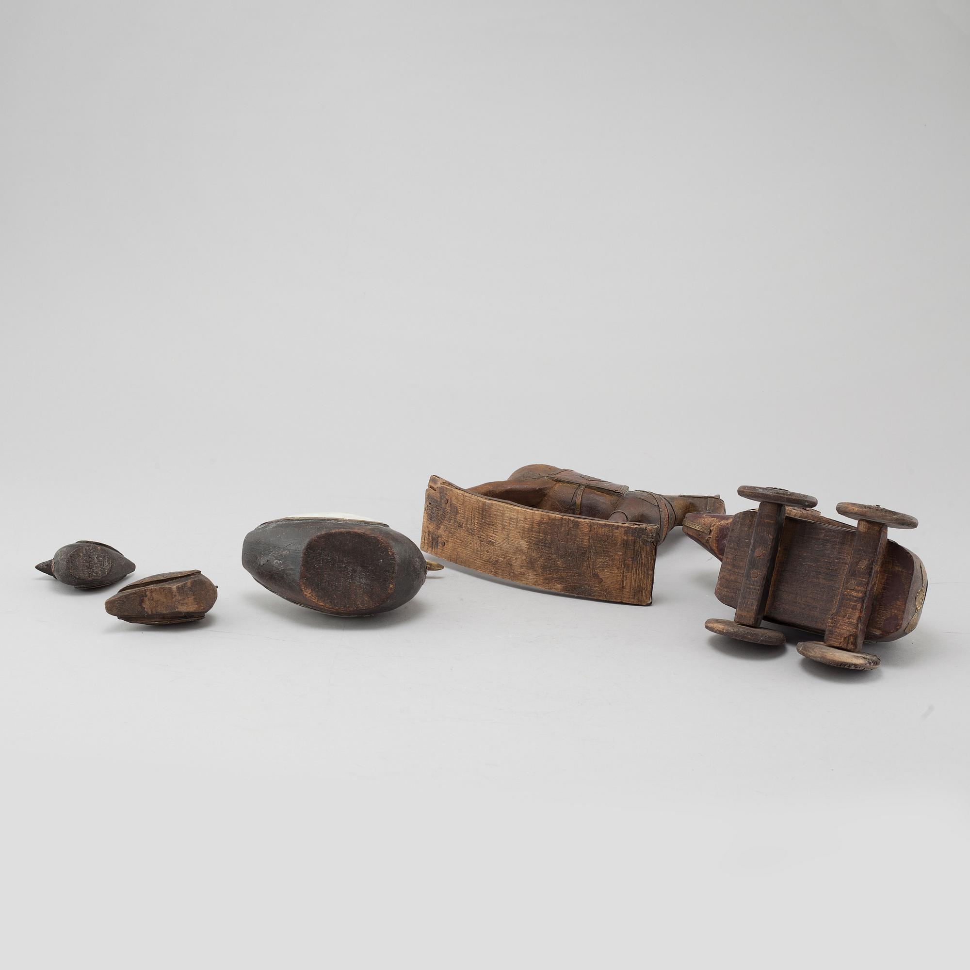 Five wooden toys from the latter half of the 20th century.