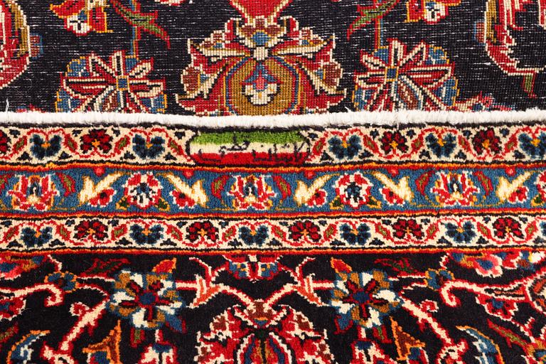 A Keshan carpet, c. 373 x 260 cm.