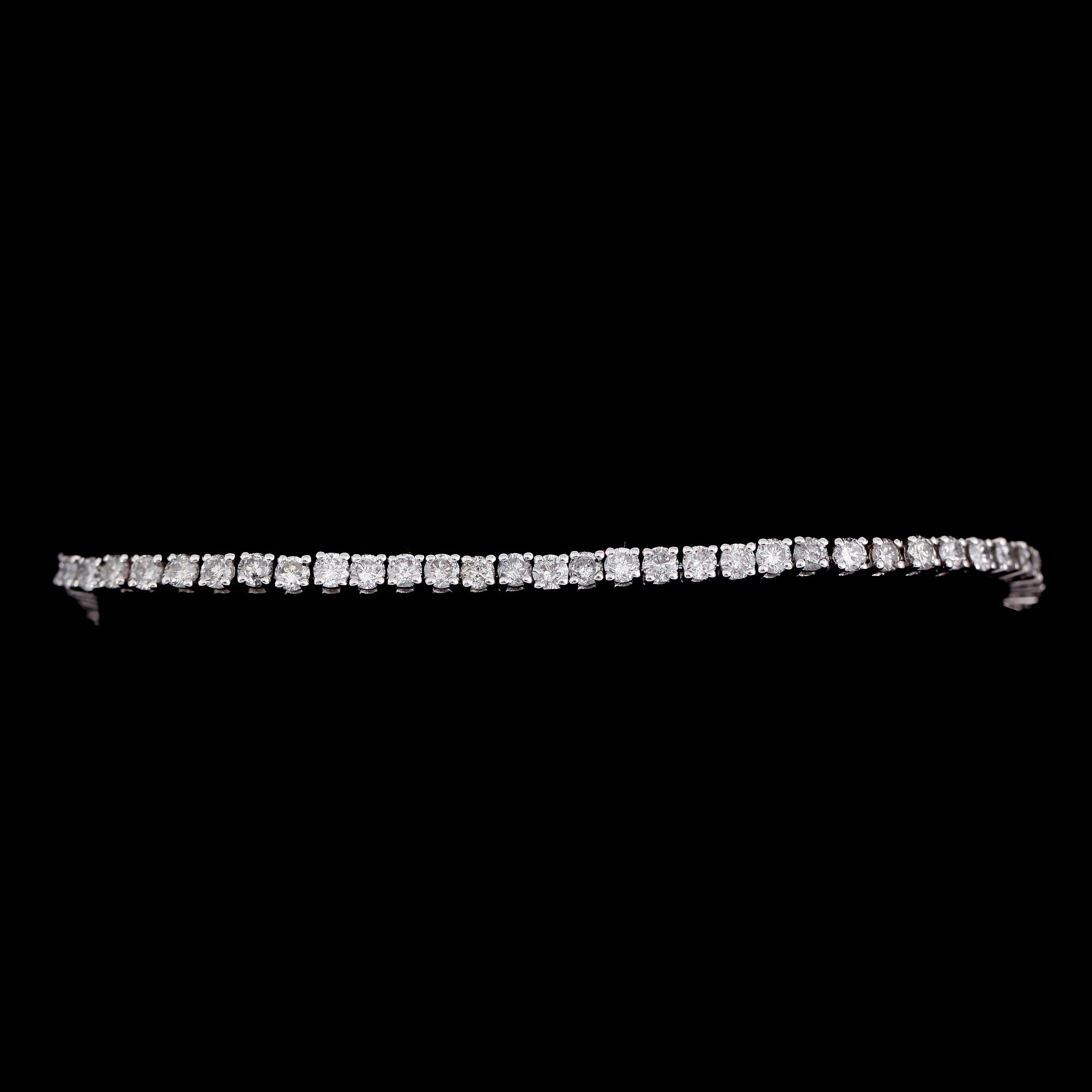 ARMBAND, 14 k vitguld, Rivière, briljantslipade diamanter tot ca 4.72 ct.