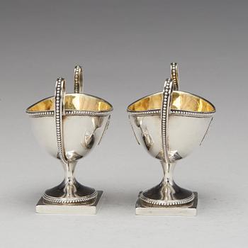A pair of Swedish late Gustavian parcel-gilt silver salt-cellars, mark of JJ Ulfsberg, Nykoping (1793-1824(-25)).