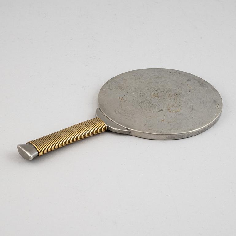 A pewter and brass hand mirror, Svenskt Tenn, 1930's.