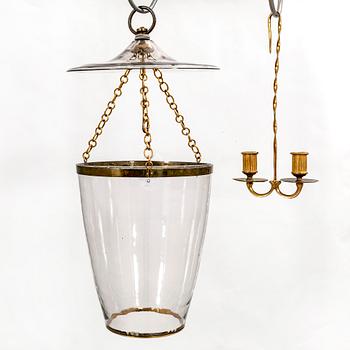 A 20th century glass pendant.