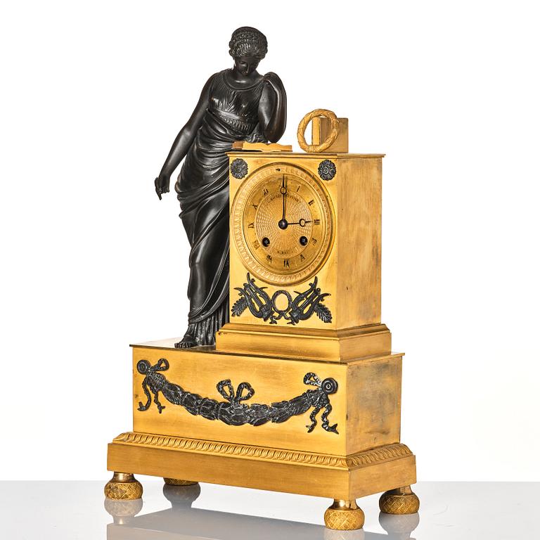 A French Empire early 19th century mantel clock, by Antoine André Ravrio.