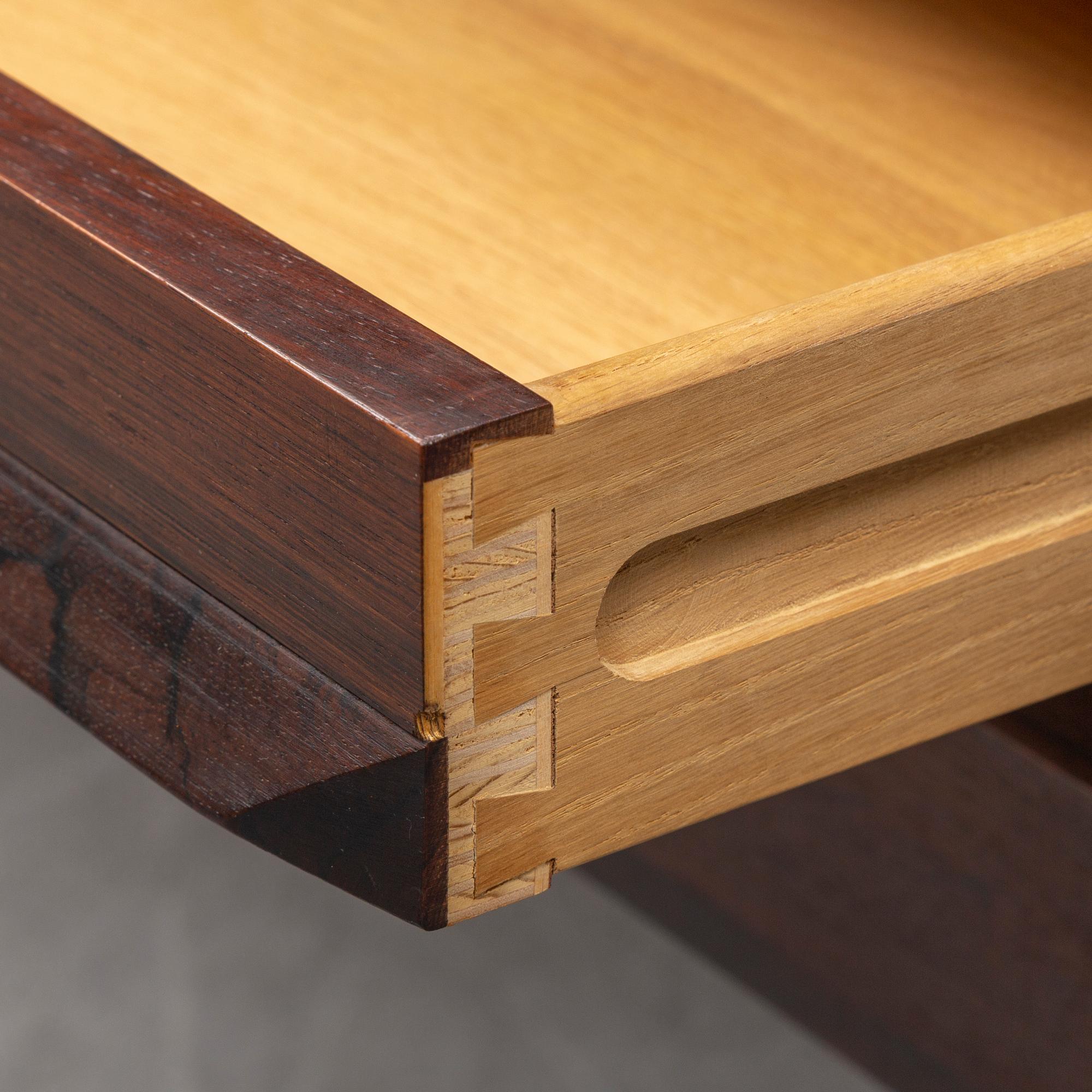 A 1960's rosewood desk by Kai Kristiansen, Feldballes Møbelfabrik, Denmark.