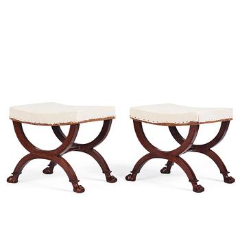 74. A pair of Directoire mahogany stools, circa 1800.