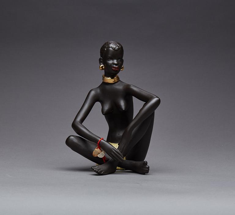 FIGURIN, etikettmärkt Goldscheider.