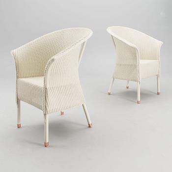 A PAIR OF ARM CHAIRS, Lloyd Loom, Spalding, England,  21st century.