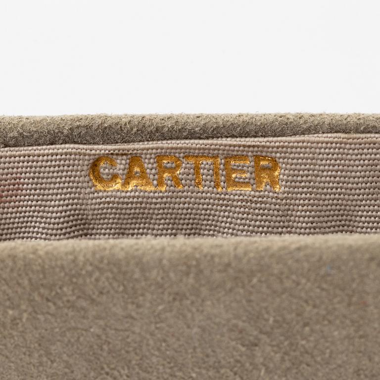 Powder box, signed Cartier, sterling silver and 14K gold with three sapphires.
