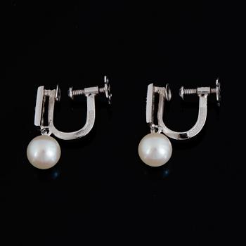 18K white gold pearl and white stone earrings, Stigbert.