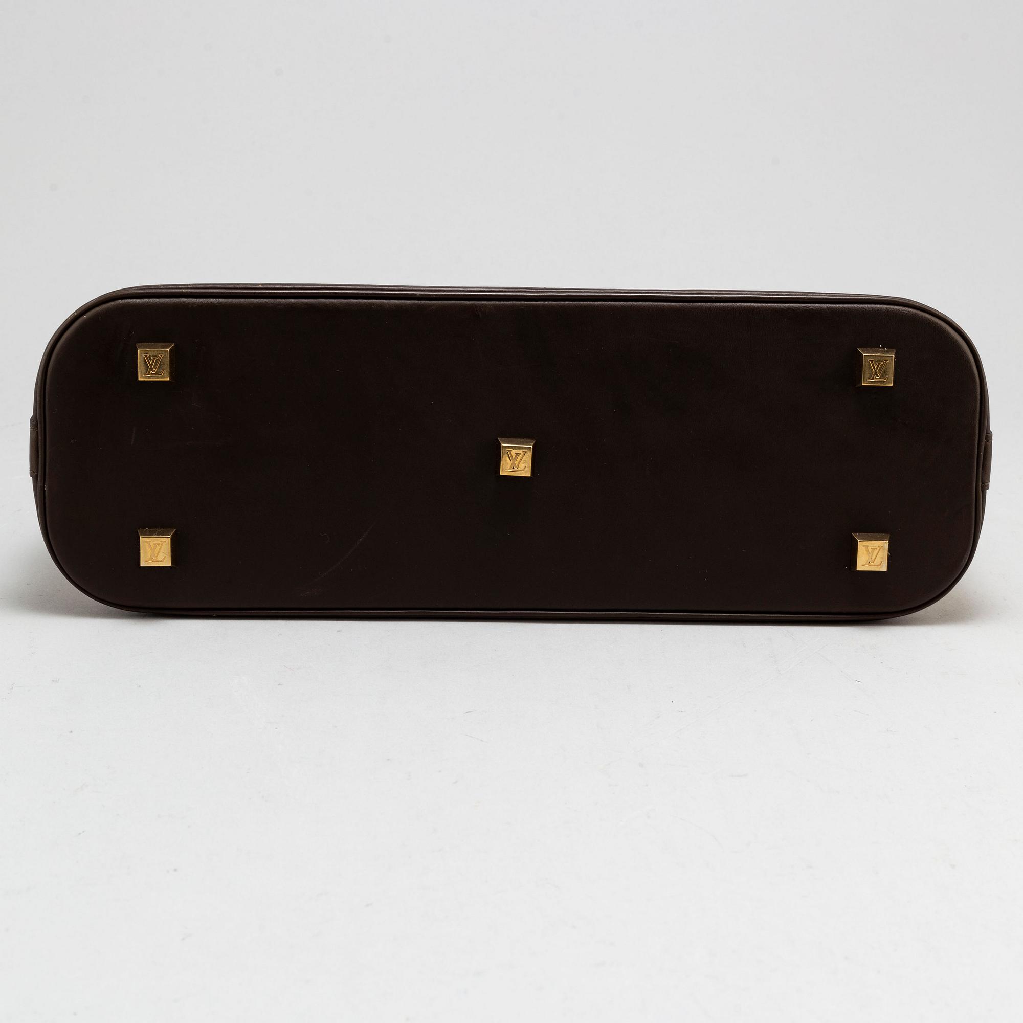 LOUIS VUITTON, a 'Monogram Mini Lin Alma Long Handbag'.